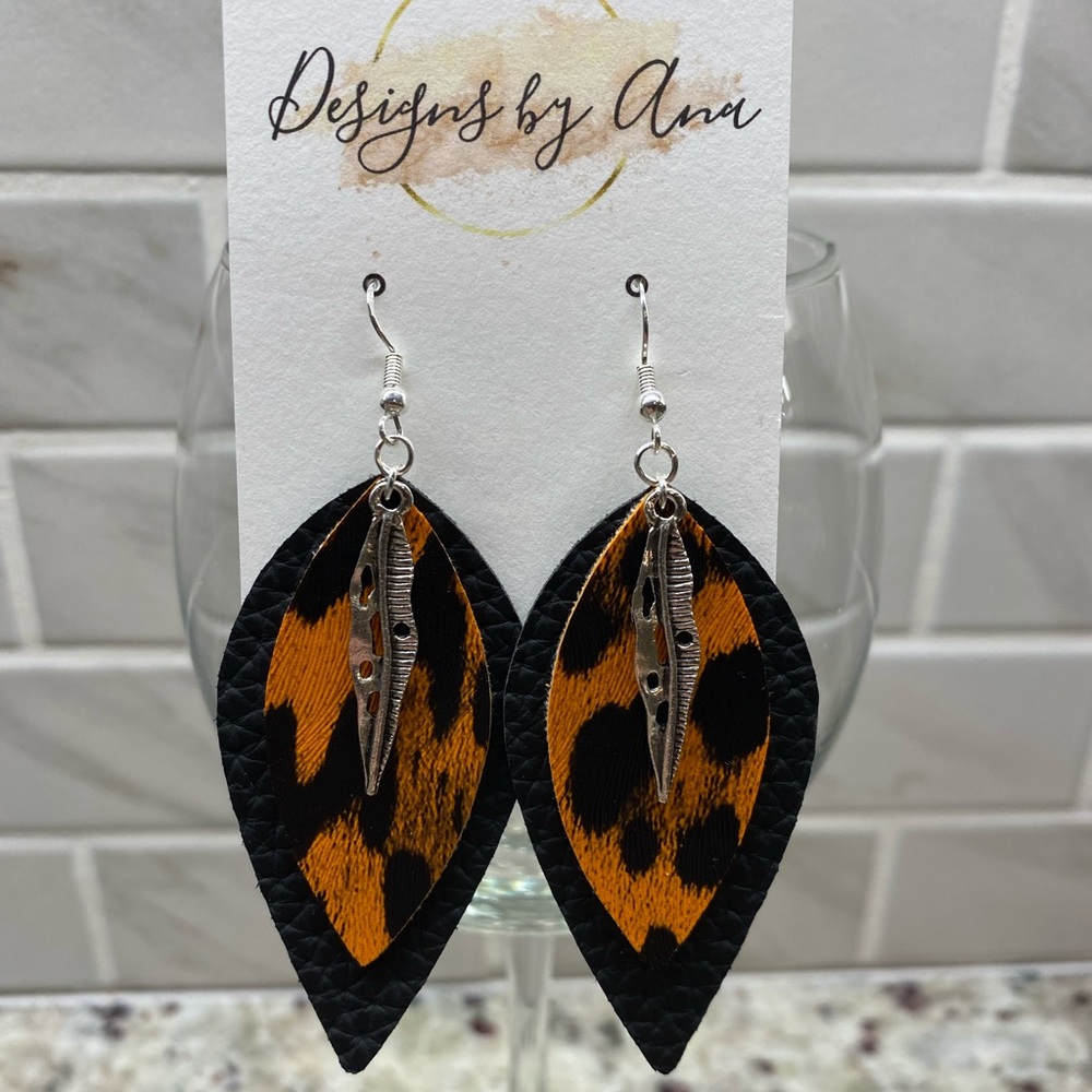 Orange and black cheetah faux leather earrings!